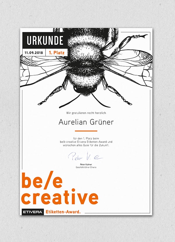 Zu sehen ist die "Bee Creative" Urkunde des ETIVERA Etiketten-Award.